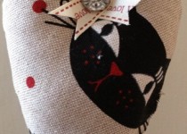 Black-Cat-hanging-heart-324x640