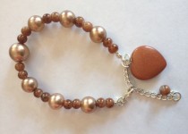 shades-of-brown-with-large-heart-charm-bead