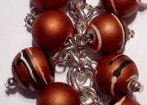 brown-bagcharm-with-silver-plated-rose-charm