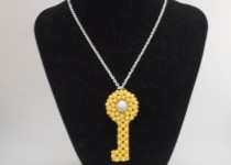 Yellow-key-silver-plated-charm
