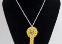 Yellow-key-silver-plated-open-charm